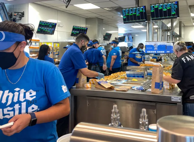 white castle employees preparing food