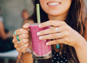 woman drinking smoothie