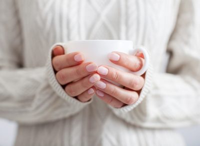 woman holding mug