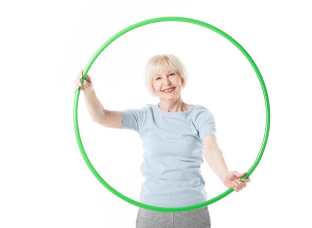 standing twists with hula hoop