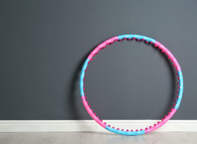 hula hoop weighted against the wall