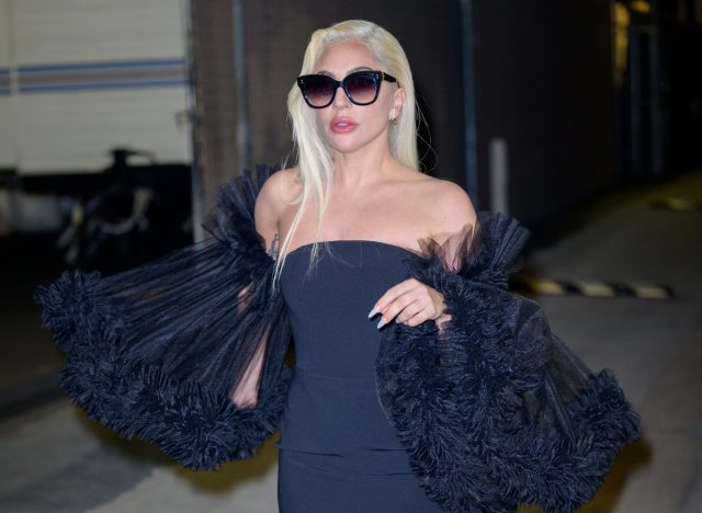 lady gaga wearing sunglasses and black dress