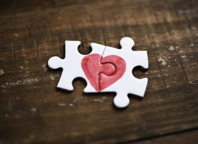 two puzzle pieces making a heart
