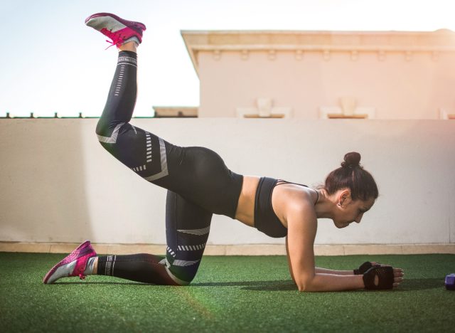 woman doing donkey kickbacks for exercise snacking