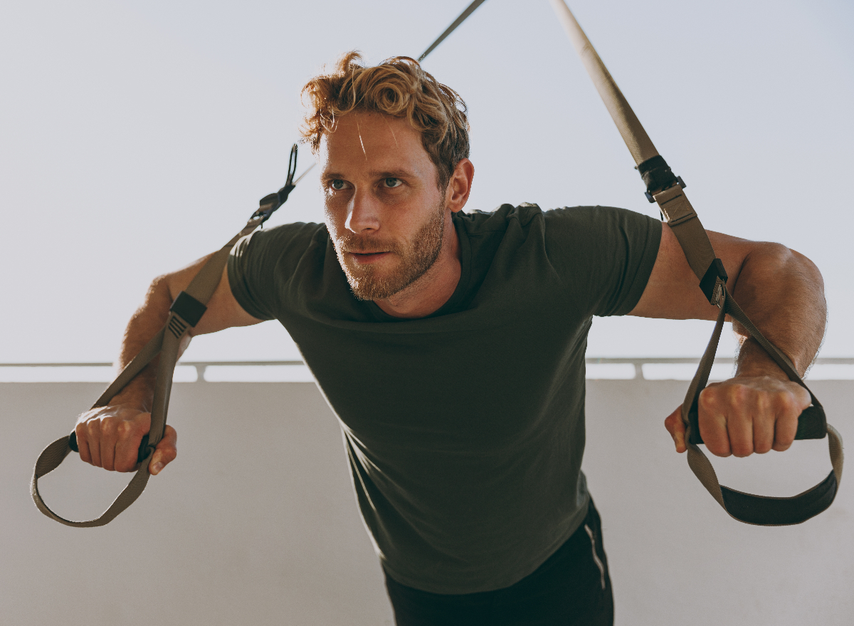 man doing suspended TRX workout