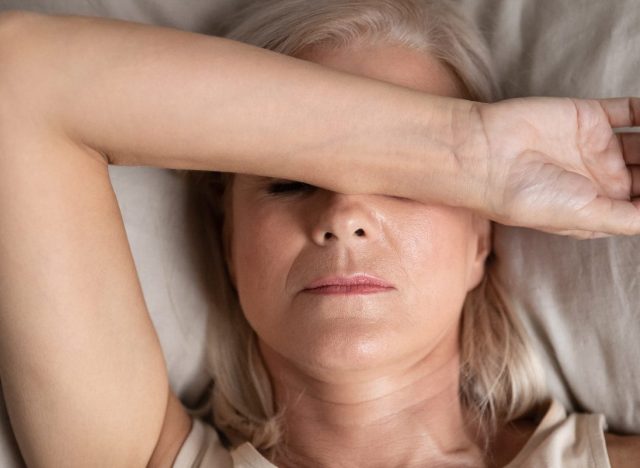 woman trouble sleeping while dealing with menopause