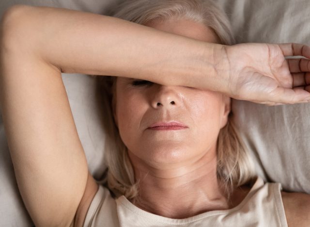 woman trouble sleeping while dealing with menopause