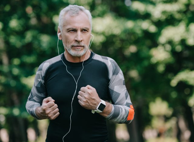 senior active man running in park to prevent future heart attack