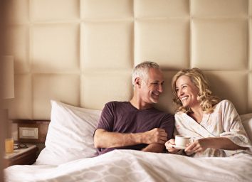 Princess Cruises couple in Princess Luxury Bed
