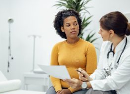 patient speaking with doctor