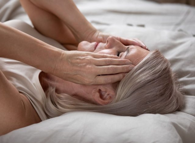 woman not able to sleep in bed