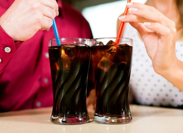 couple drinking soda