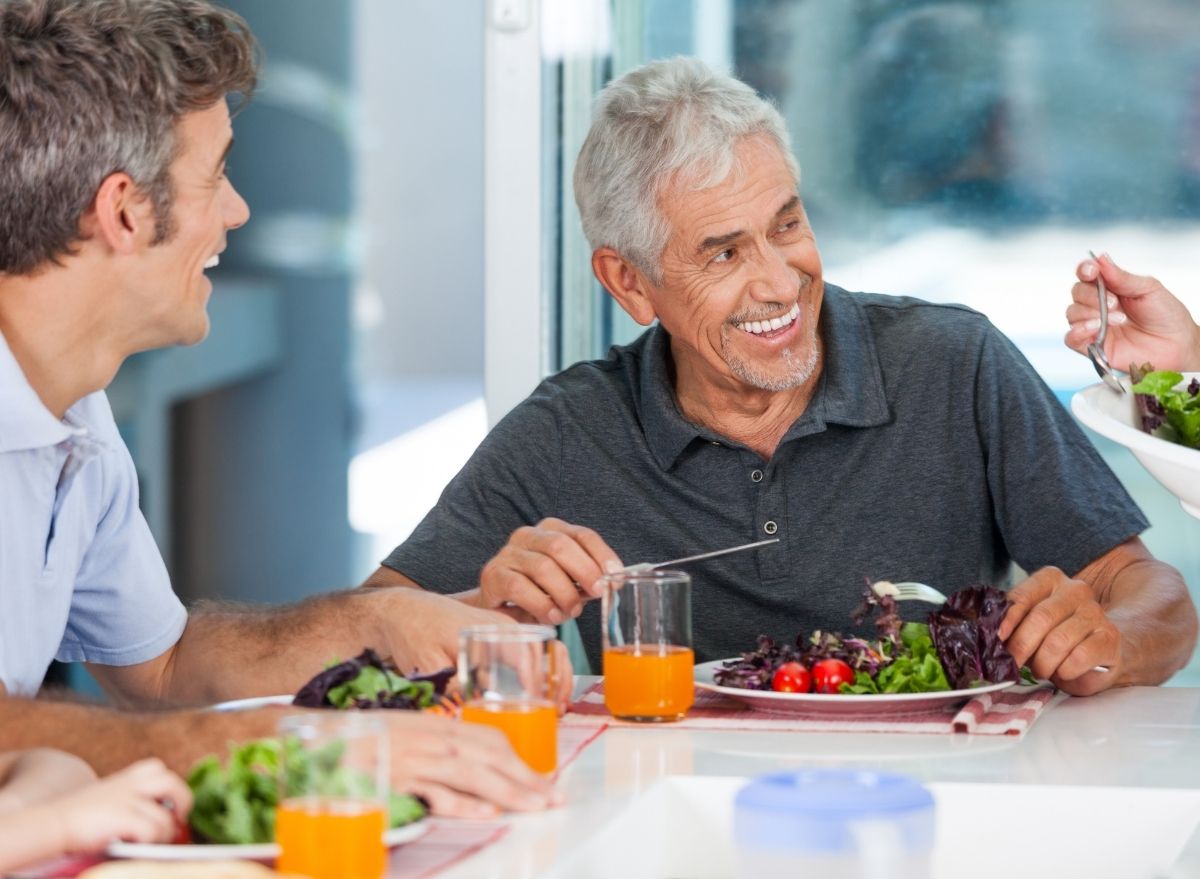 man eating a salad