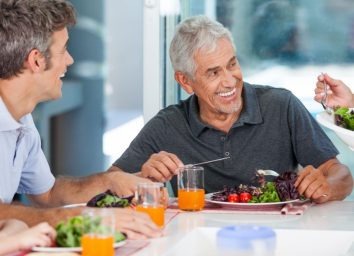 man eating a salad