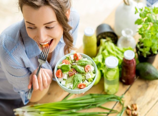 mindful eating a salad, concept of daily weight loss habits