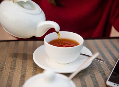 pouring black tea