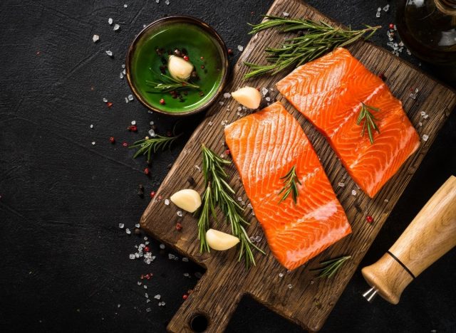salmon filet on cutting board, foods for building muscle mass