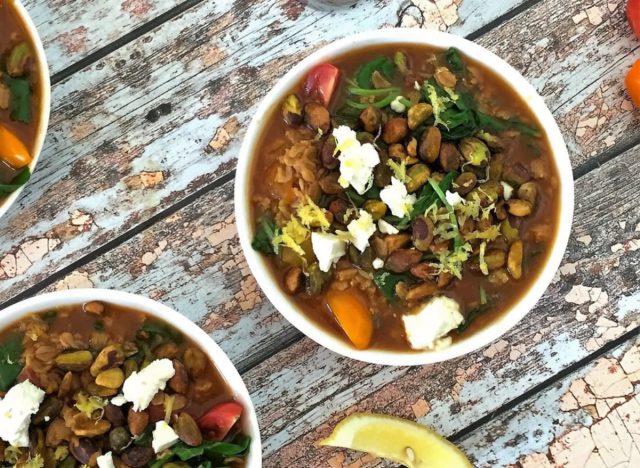 savory oatmeal with pistachios, kale, grape tomatoes, and feta