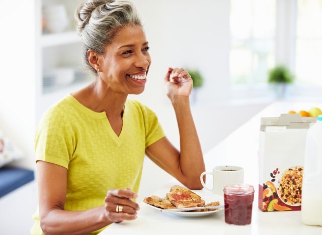 woman eating at table