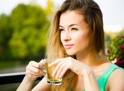 woman drinking green tea