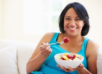 middle aged woman eating