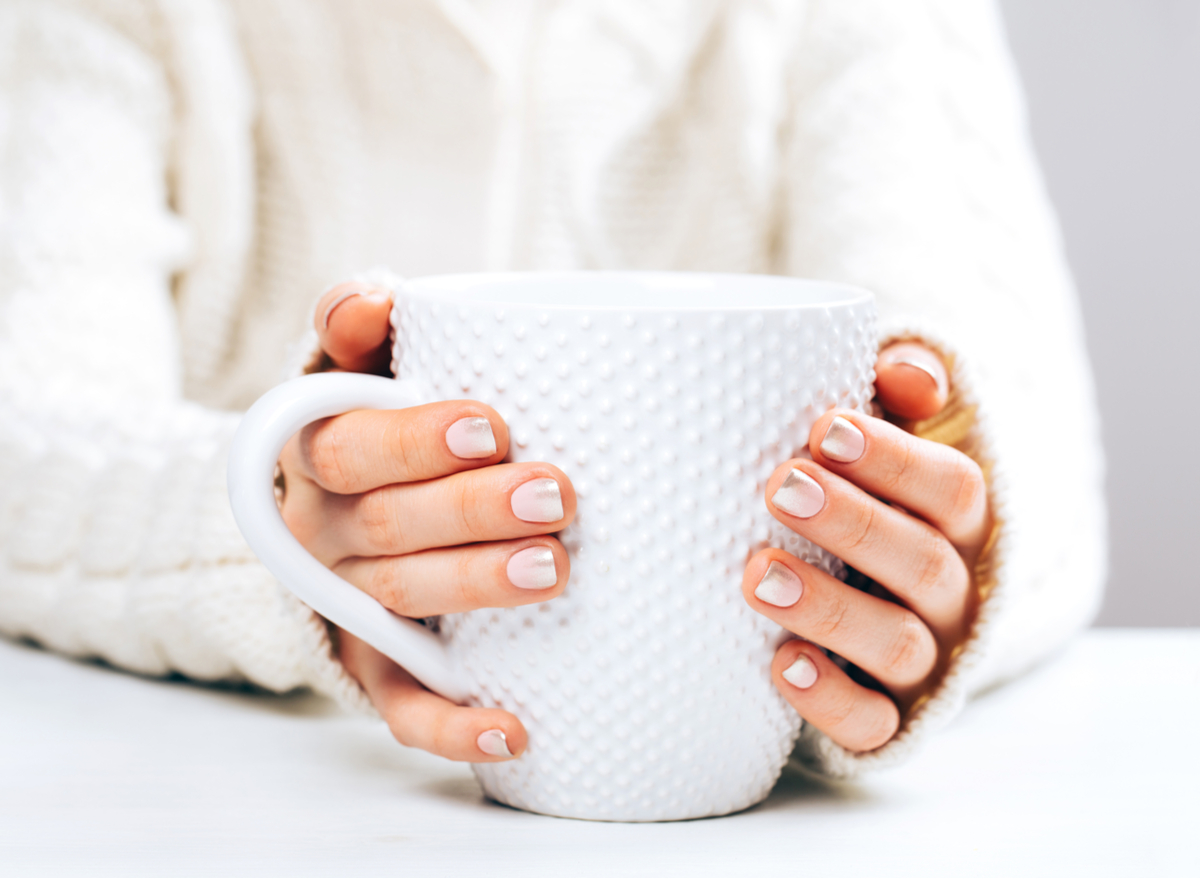 woman holding mug