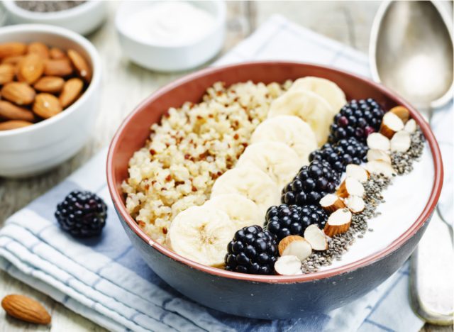 yogurt with fruit, almonds, chia seeds, and quinoa