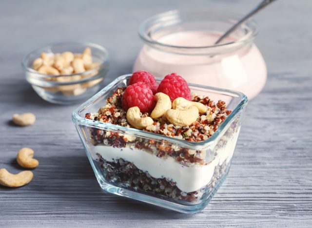 yogurt with quinoa, cashews, and raspberries