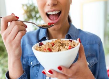 Woman Eats Cereal