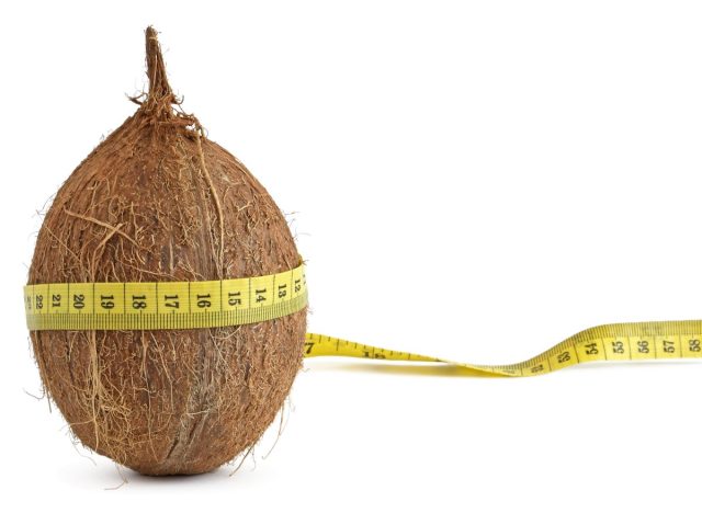 Coconut with measuring tape