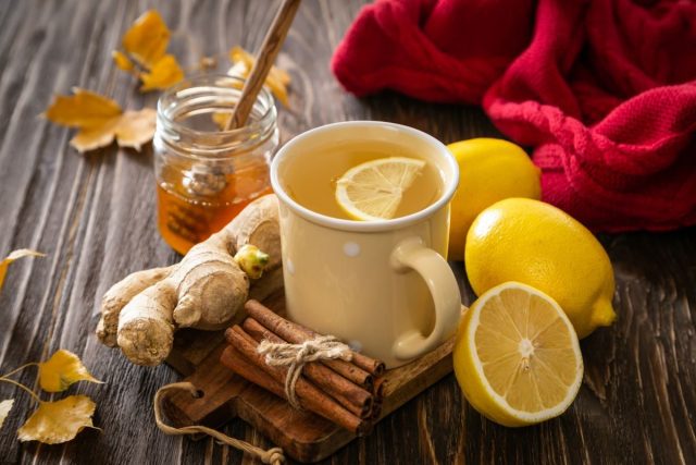 Ginger tea with lemon, honey, and cinnamon