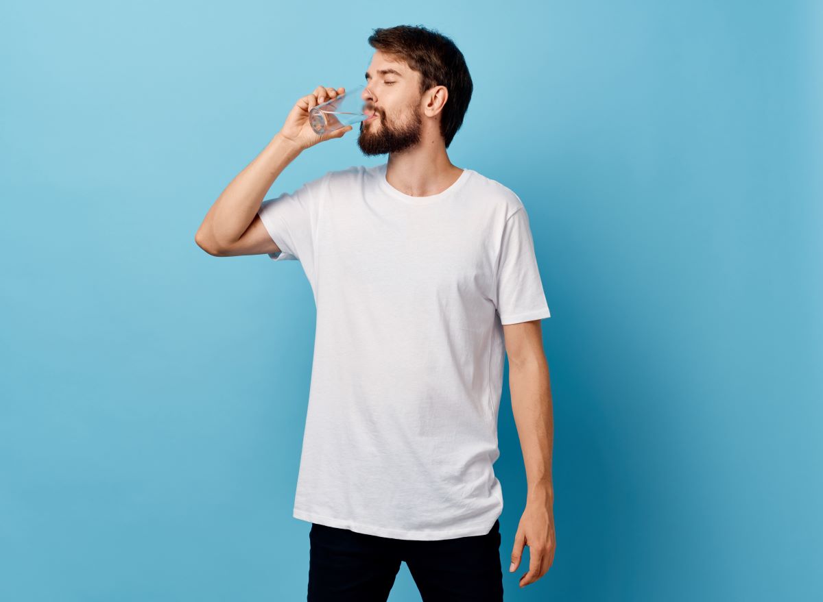 Man Drinking Glass of Water