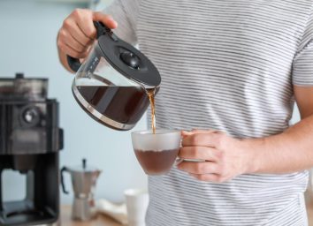 Man Pouring Coffee from Pot