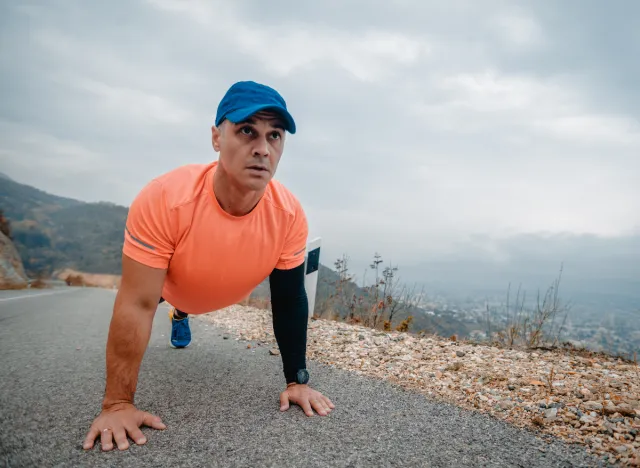 man doing plank outside, exercises to get rid of a sagging lower belly