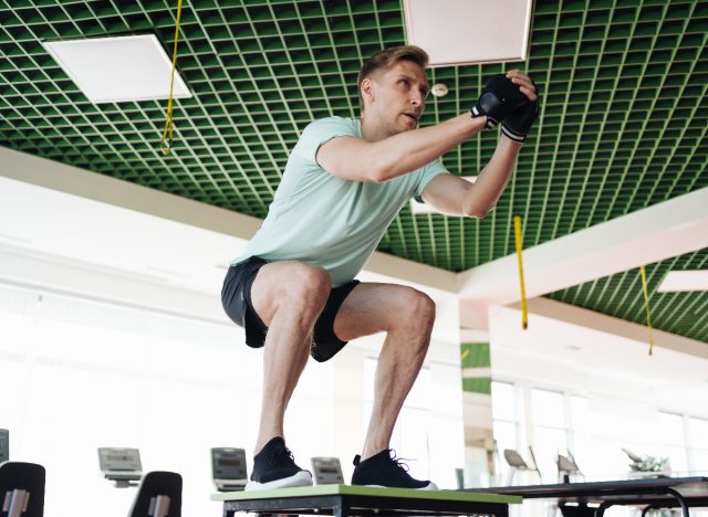 man doing jump squat, exercise to lose fat in your waistline