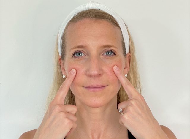 crow's feet face yoga exercise