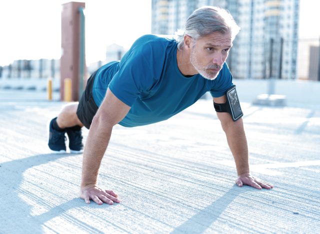 middle aged man pushup outside