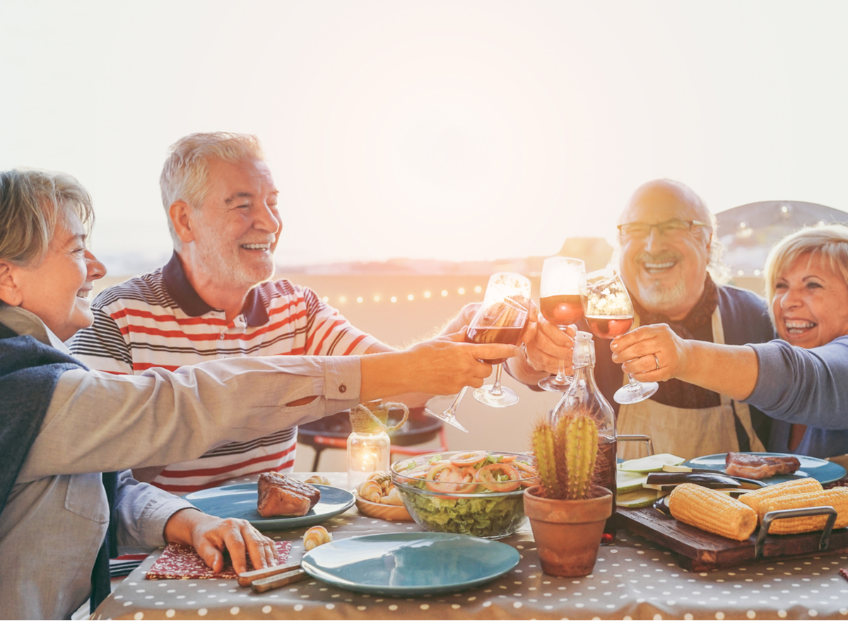 Older people eating together