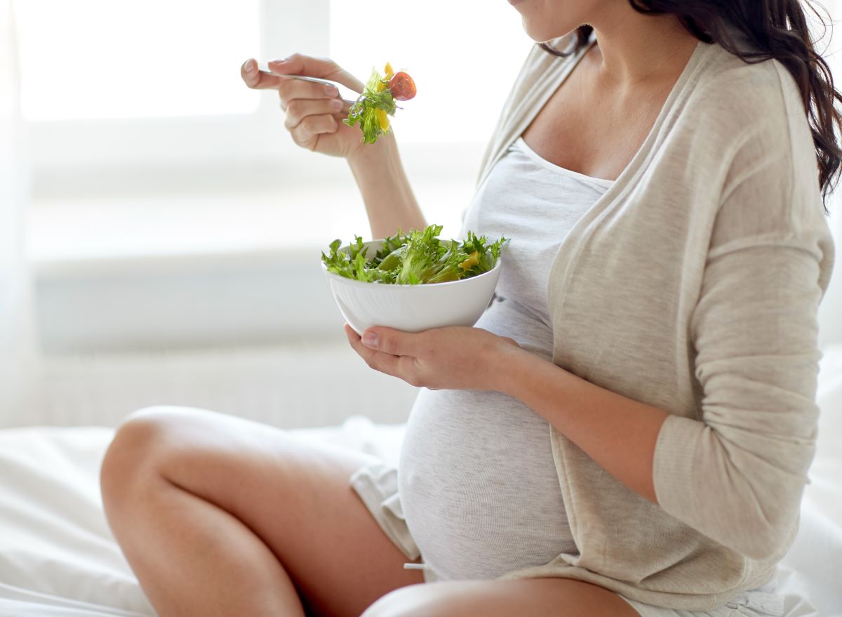 Pregnant Woman Eating Salad