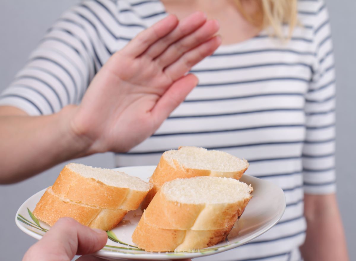Woman Refusing Bread