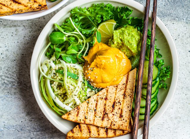 buddha bowl with zucchini noodles and grilled tofu