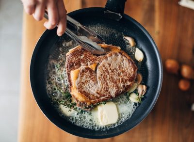 cooking steak with butter