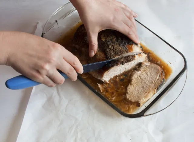 cutting cooked meat