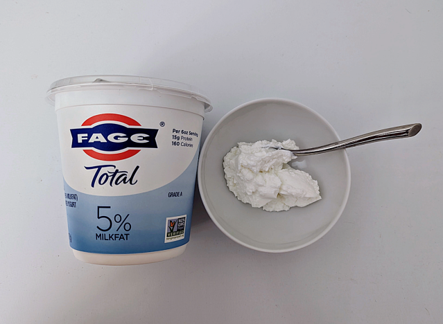 fage yogurt container and yogurt in a bowl.