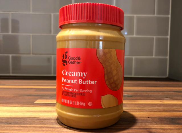 good and gather peanut butter jar on a table.