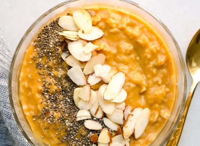 pumpkin flavored oatmeal with crunchy nuts and chia seeds