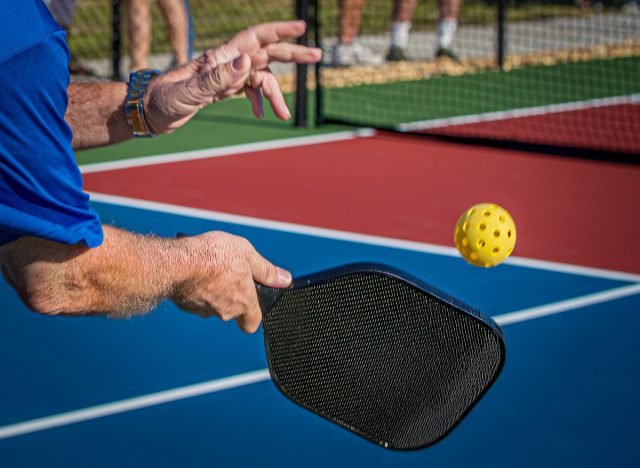 closeup of pickleball serve