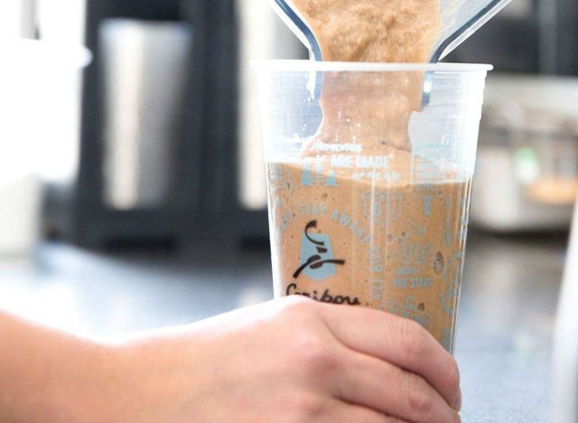 pouring caribou coffee drink