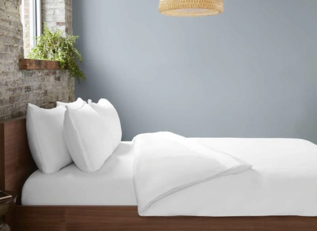sheex white sheet set on bed