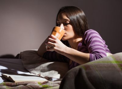 woman drinking before bed